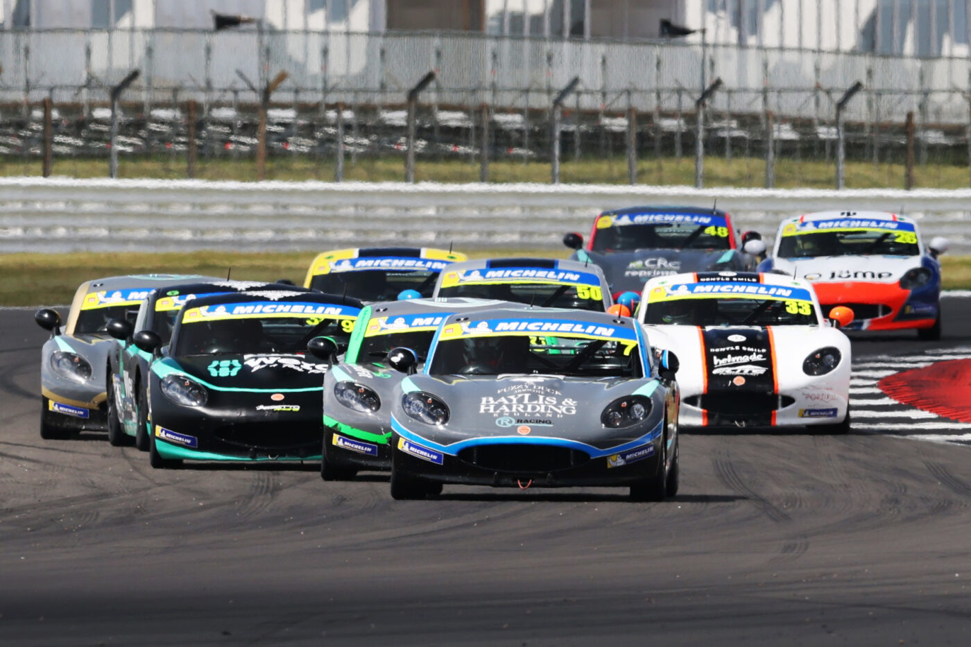 cars racing in the 2023 Michelin Ginetta Junior Championship